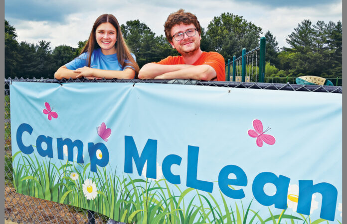 People behind Camp McLean banner