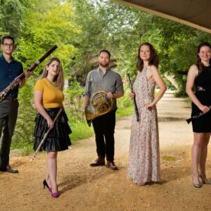 District5 quintet posing with instruments