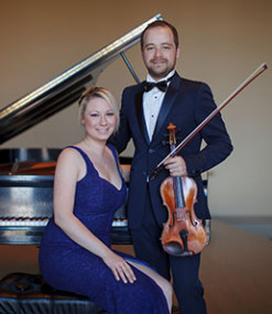 Borisevich duo posing with instruments
