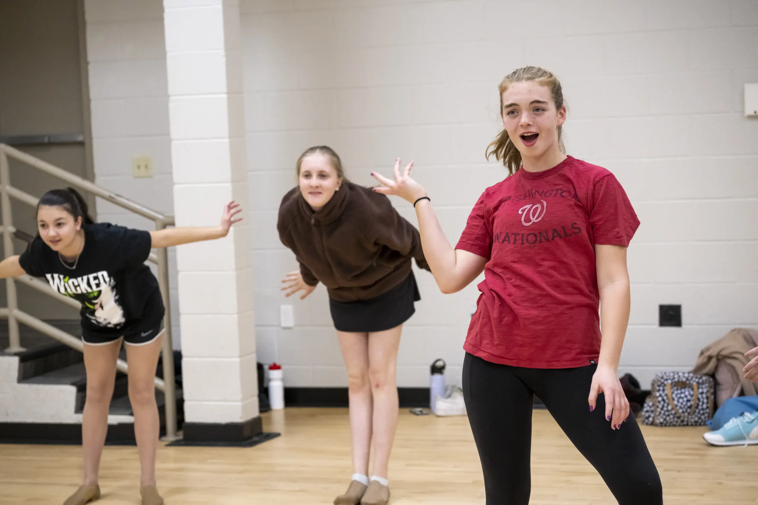 Girls practicing musical theater.