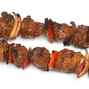 Lamb kebabs with red onion and pepper