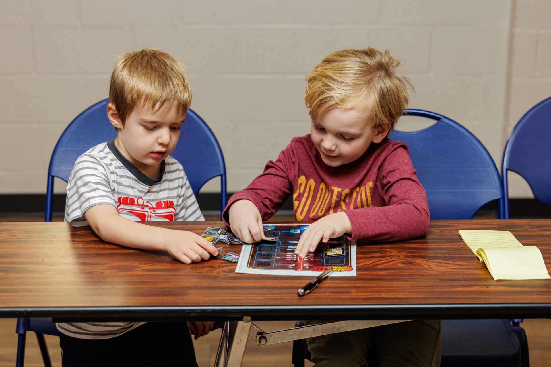 Boys putting together a circuit